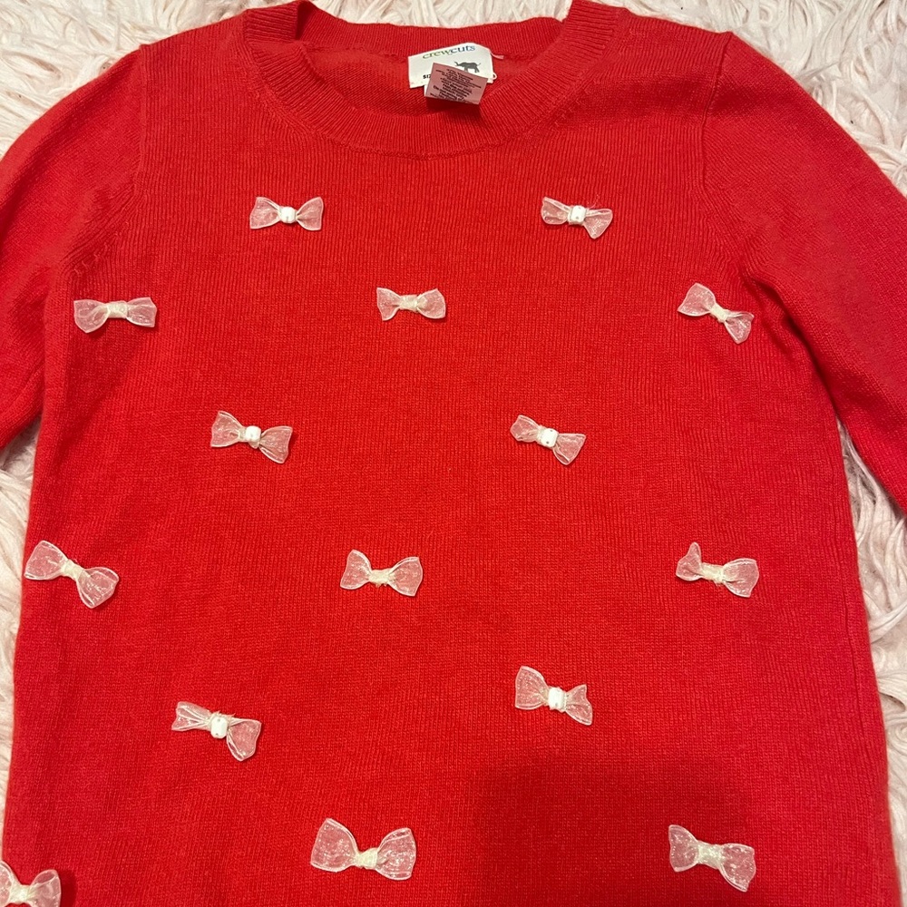 Crewcuts girls sweater with white bows.